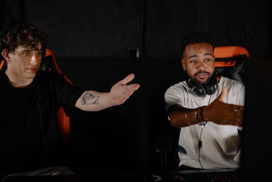 Two men intensely gaming, showcasing teamwork and strategy in a competitive online session.