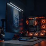 High-tech gaming computer setup featuring glowing LED fans and a dual monitor display. – best pc hardware setups