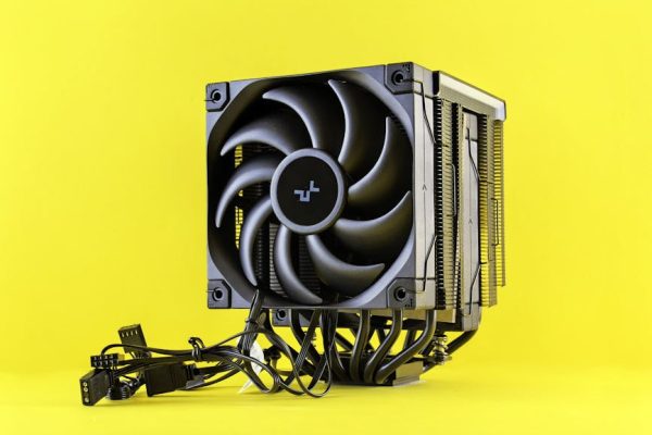 A sleek and modern CPU cooler with cables displayed against a vibrant yellow backdrop.