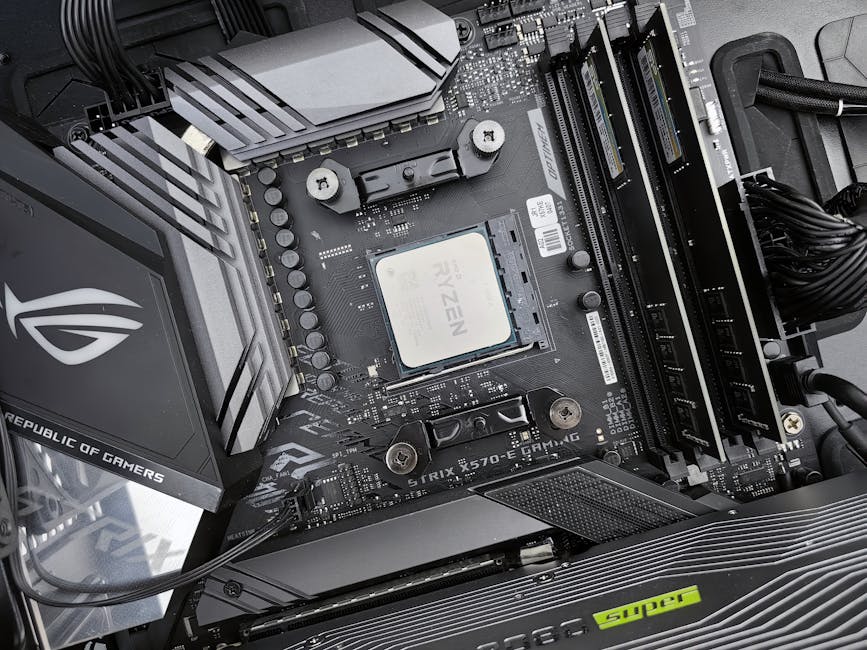 Detailed view of a gaming motherboard, showcasing an AMD processor and components.