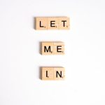 Scrabble tiles forming the phrase 'Let Me In' on a white background, with ample copy space. – best gaming pc for