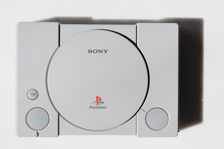 Close-up of a classic Sony PlayStation console on a white background