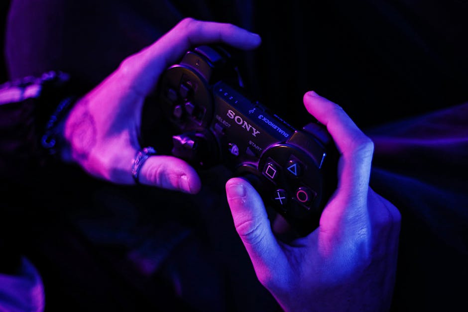 Hands grasping a gaming controller in a purple-lit room, highlighting immersive play.