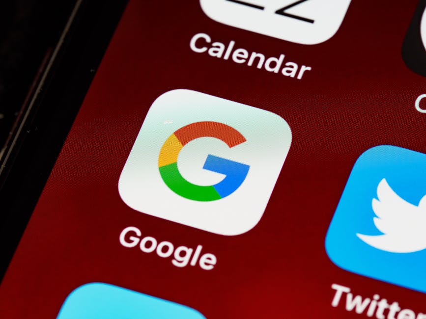 Macro view of a smartphone displaying Google and other app icons on the home screen. – Google Pixel 11 design