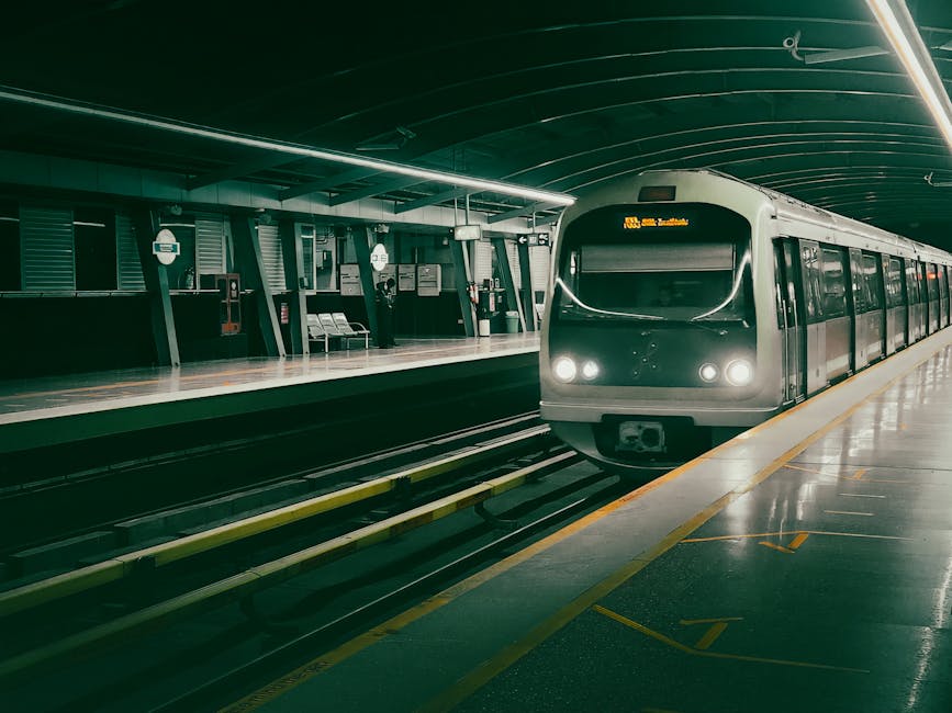 A sleek metro train approaching a station in Bangalore, India at night, showcasing urban transport. – Metro 2039 Reveal Analysis