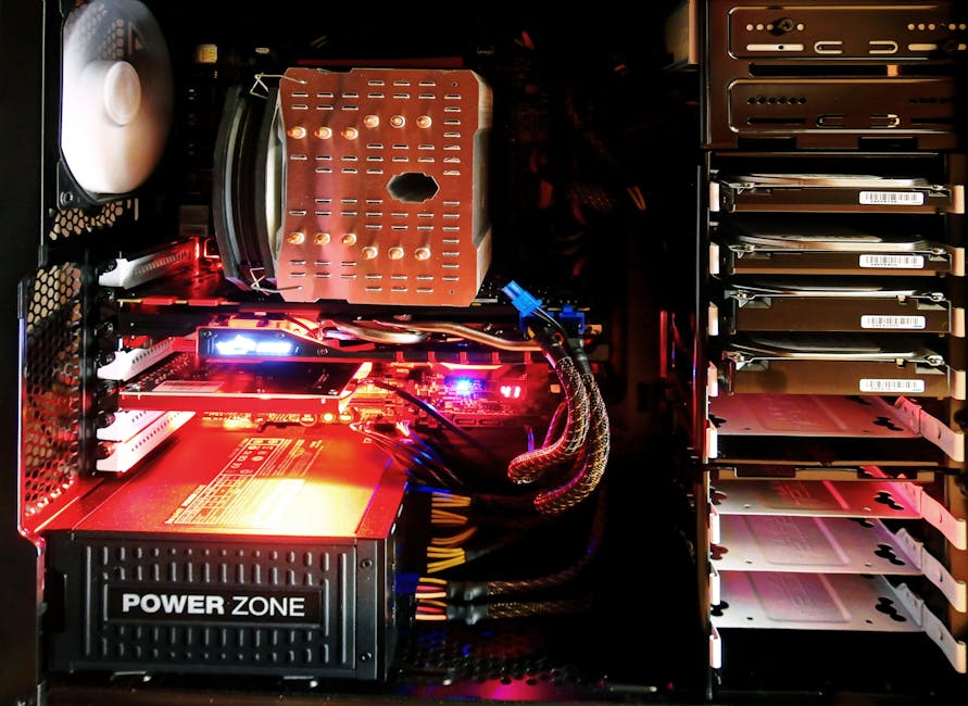 Close-up of a custom gaming PC with RGB lighting, showcasing power supply and components.