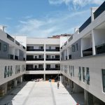 Daytime view of a modern apartment complex under construction, showcasing sleek design and architecture in Lagos, Nigeria. – Nut65 New Build