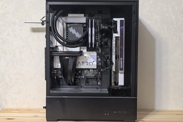 Interior view of a custom-built gaming PC showing components like GPU and cooling system.