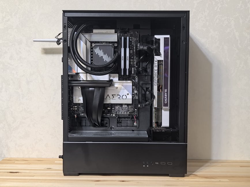 Interior view of a custom-built gaming PC showing components like GPU and cooling system.