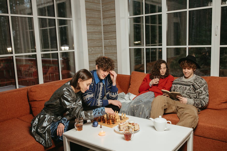 A group of friends enjoying a cozy indoor evening, sipping drinks and playing chess together. – Steam Cozy RPG Disappearance Tetris Controversy