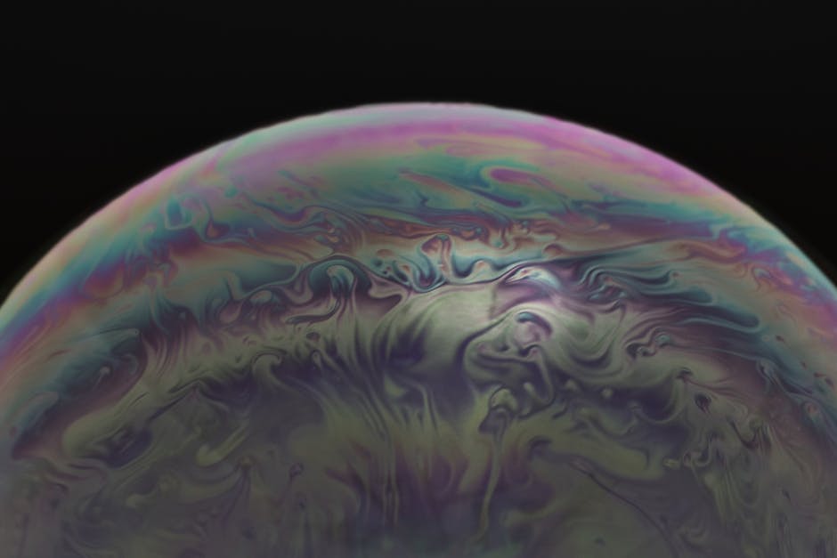 Vibrant macro image capturing the swirling colors and patterns of a soap bubble. – AI bubble in the tech industry