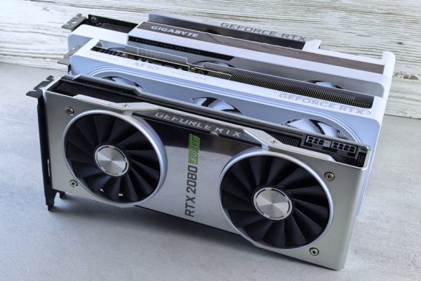 Three NVIDIA GeForce RTX graphics cards stacked on a surface, showcasing their sleek design and branding details. – best budget gpu 2026