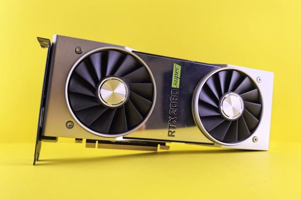 Close-up of a RTX 2080 Super graphics card against a bright yellow backdrop, showcasing high-tech design. – RTX 5090 Sweden review