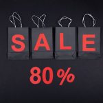 Highlighting a sale with 80% discount using black shopping bags and bold red text. – used gpu sale discount